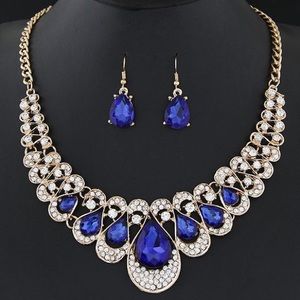 Royal blue gemstone metal collar necklace earrings set with diamonds